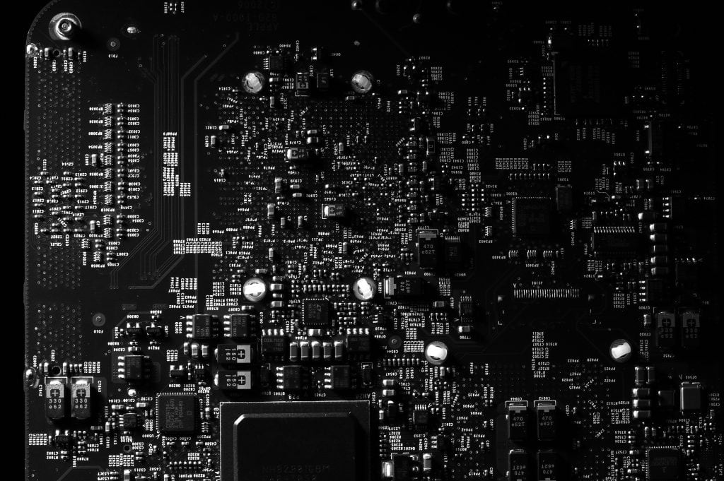 AI explained - circuit board and computer chip representing artificial intelligence hardware, AI news hub