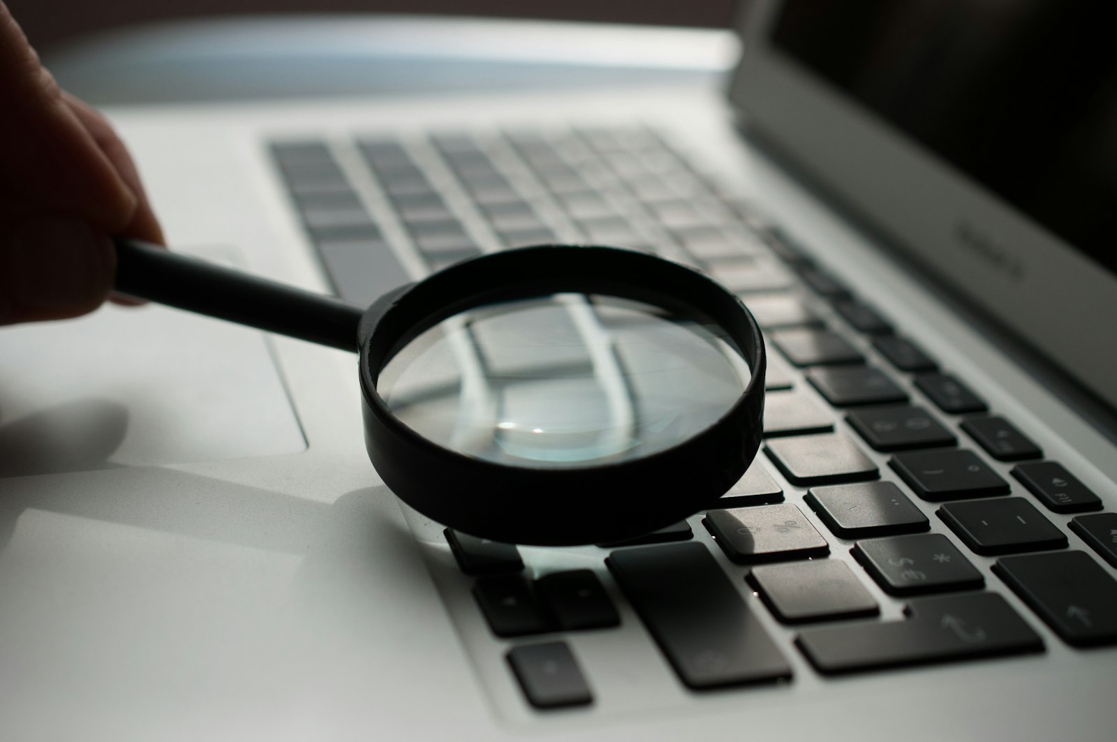 How to spot AI-generated images using a magnifying glass approach to digital verification