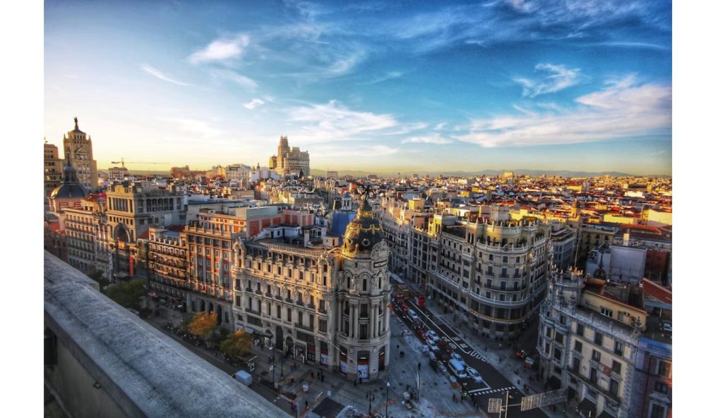 France and Spain wildfires: aerial view of Madrid's Gran Via skyline at sunset, the Spanish capital threatened by nearby fires