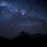 Perseid meteor shower 2026 streaking across the Milky Way over mountains