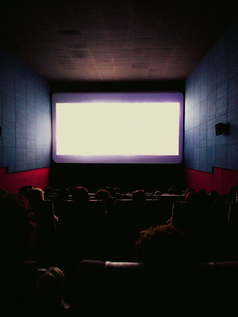 The Odyssey movie audience watching a big cinema screen