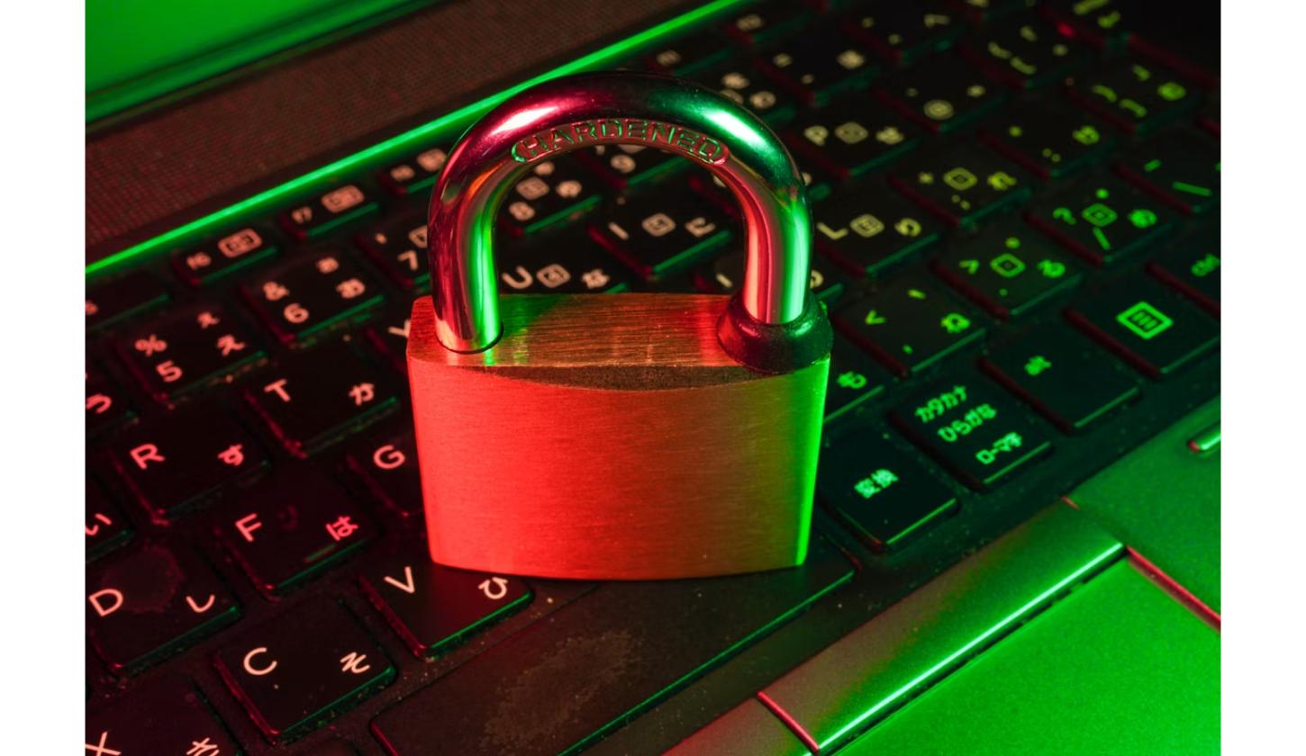 Red padlock resting on a keyboard, symbolizing the privacy rules at the center of Apple's App Tracking Transparency dispute