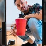 Viral trends right now - content creator filming a video on smartphone for social media