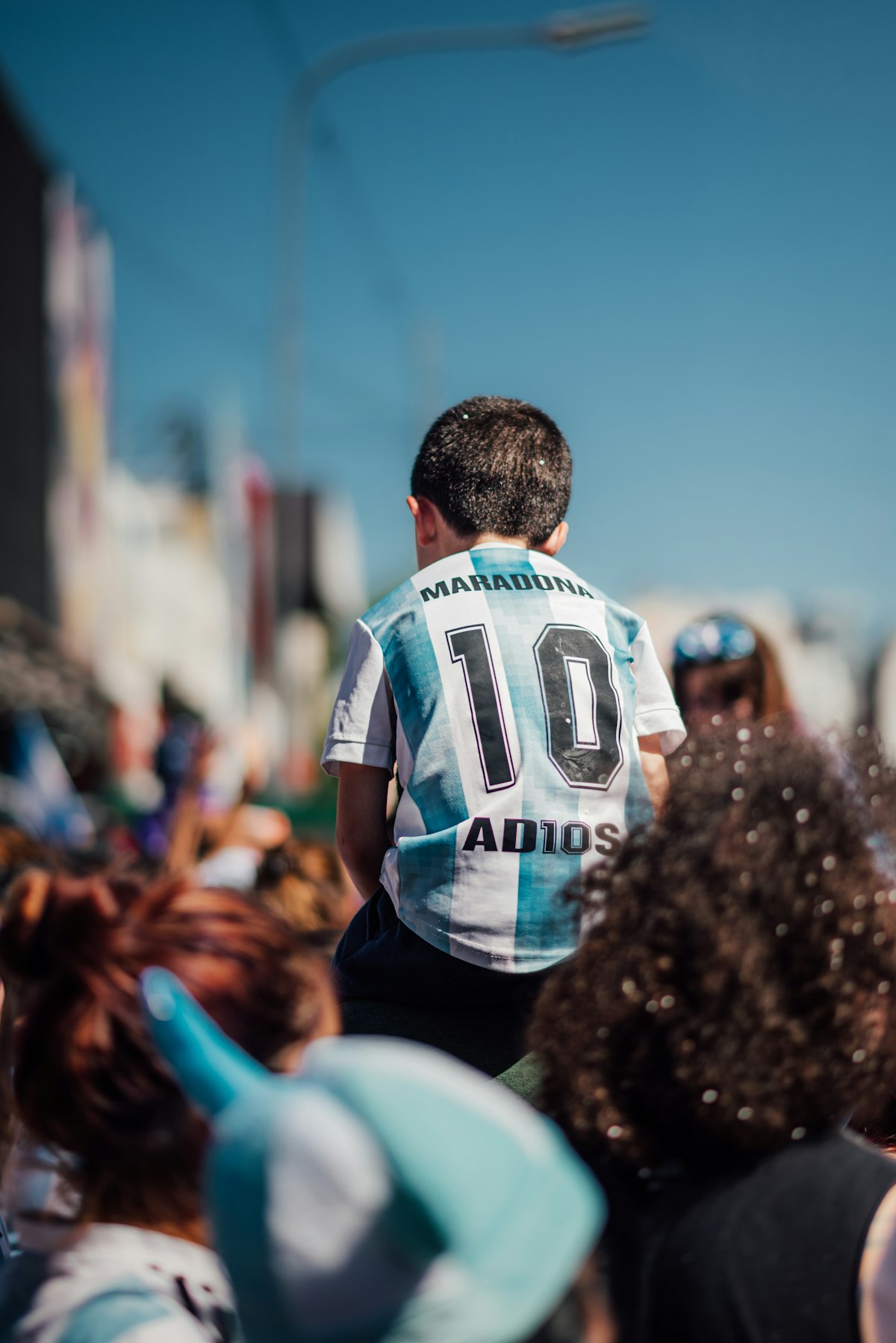 Argentina fan wearing number 10 jersey celebrating in the crowd during World Cup 2026
