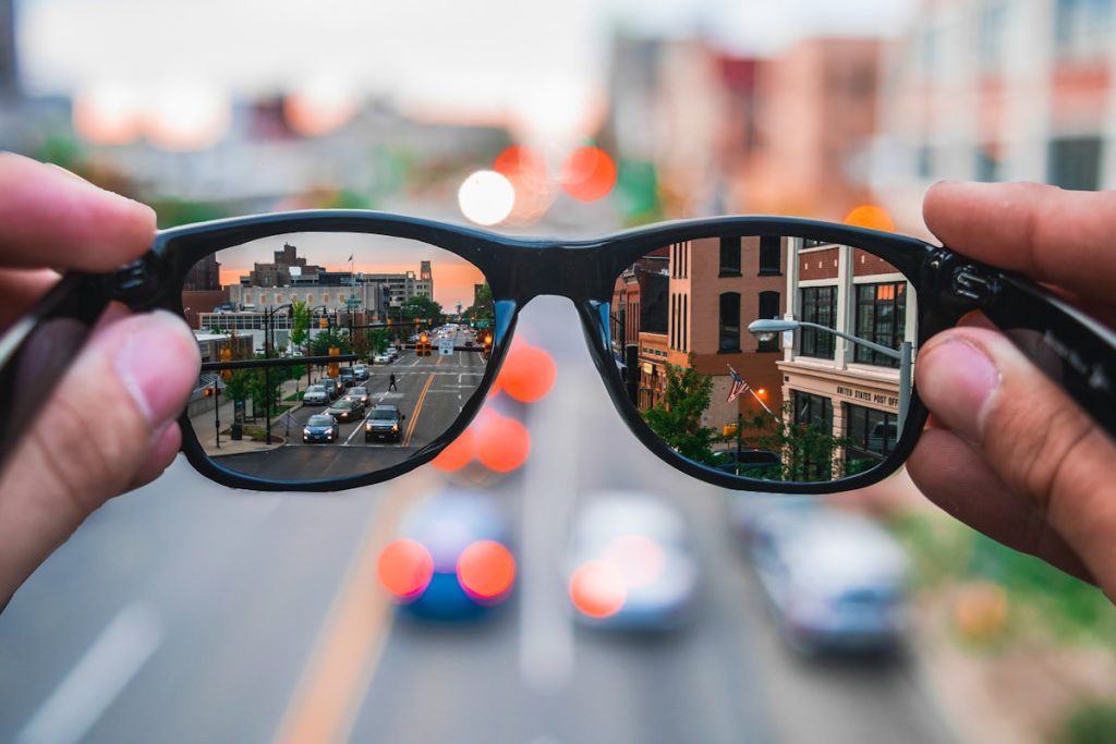 City street reflected in smart glasses lenses, representing next-gen wearable tech