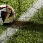 World Cup 2026 technology - the Adidas Trionda smart ball on the pitch behind the goal net